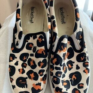 Bucket Feet Slip-On Canvas Shoes in Black & Orange Cat Print